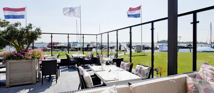 Terras aan het water Bij Benjamin